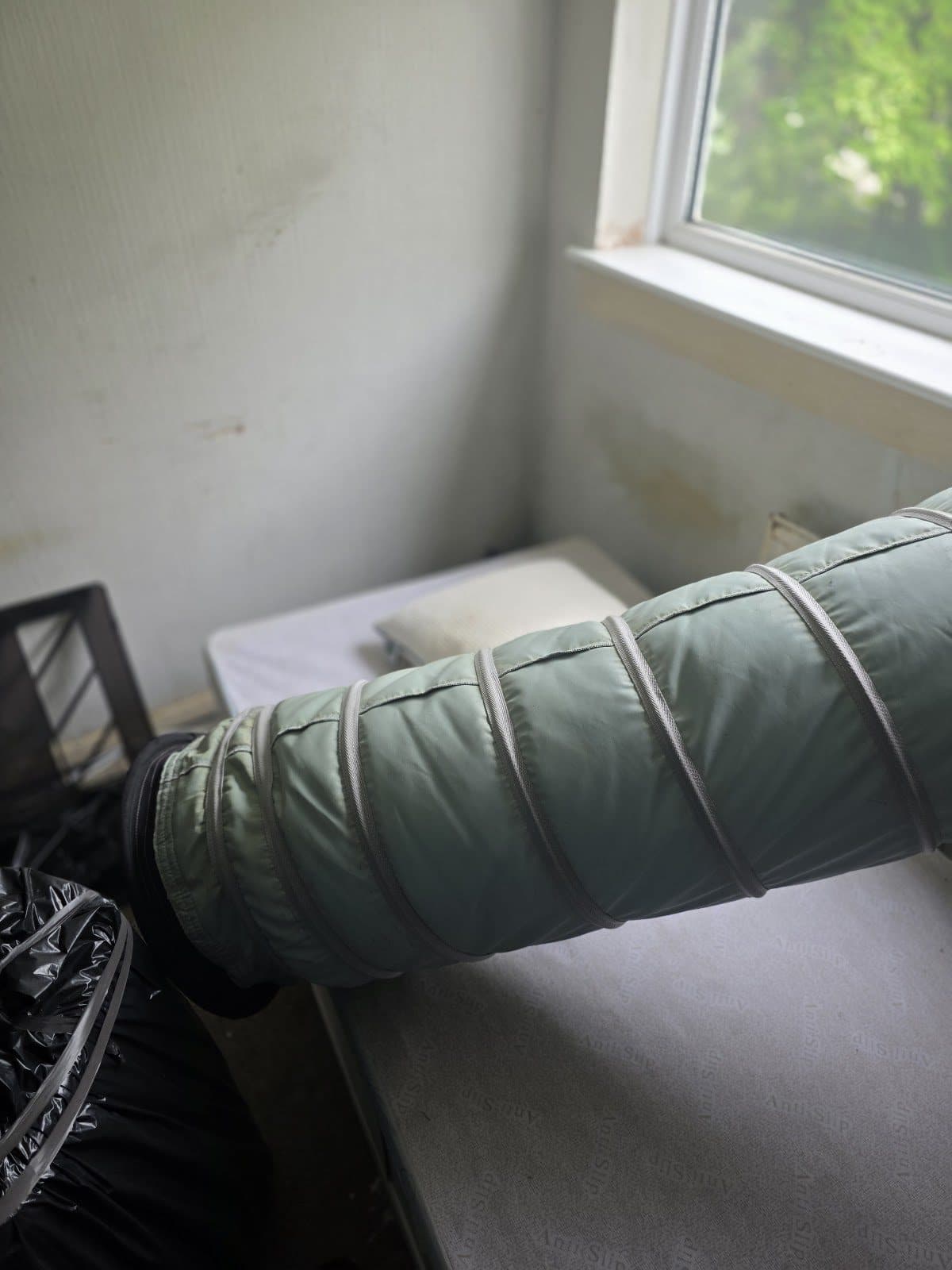 Heat treatment ducting reaching a bedroom during bed bug treatment